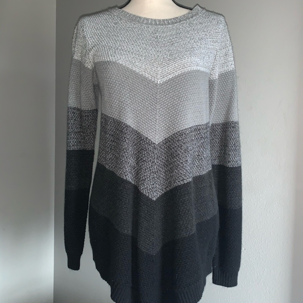 Long sweater. Hangs well